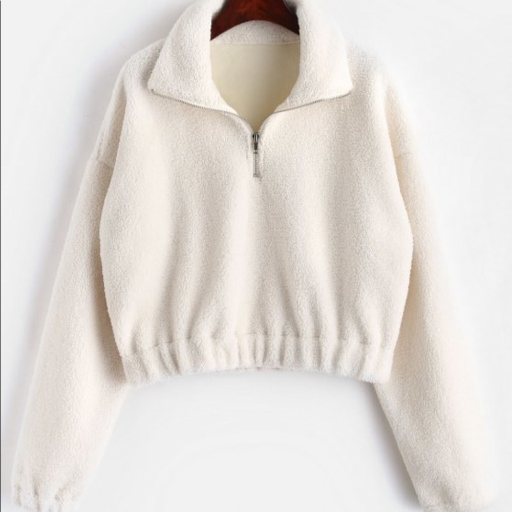 White sherpa half zip pull over jacket